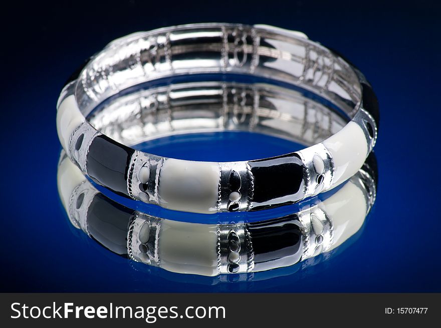 Bracelet with blue background and mirrored