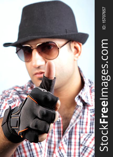 Male model boy showing thumbs up sign.