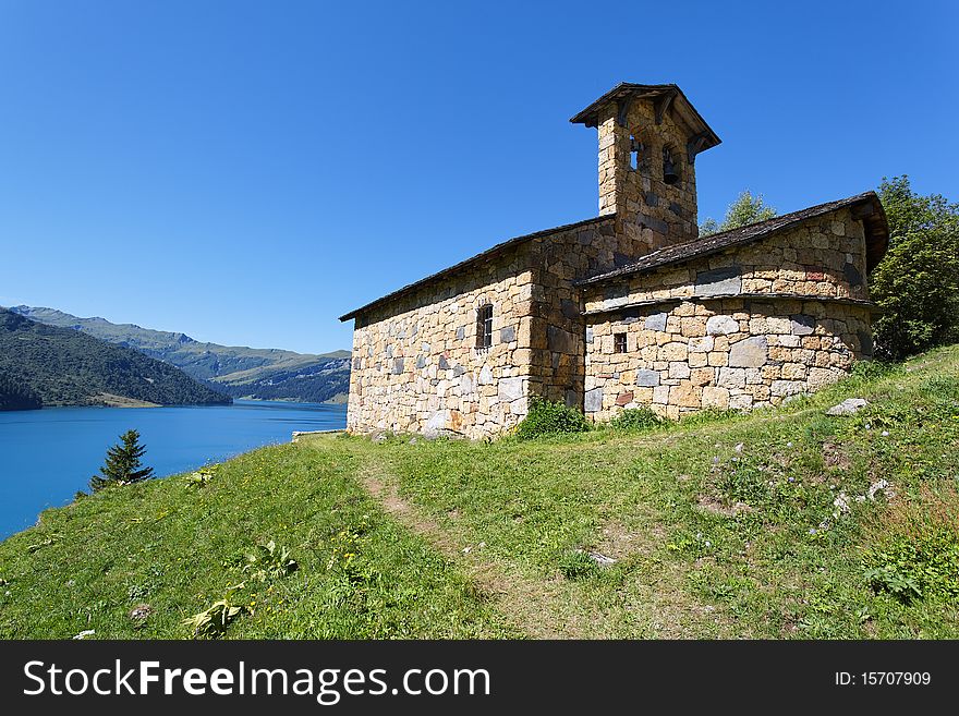 Chapel and lake in french mountain. Chapel and lake in french mountain
