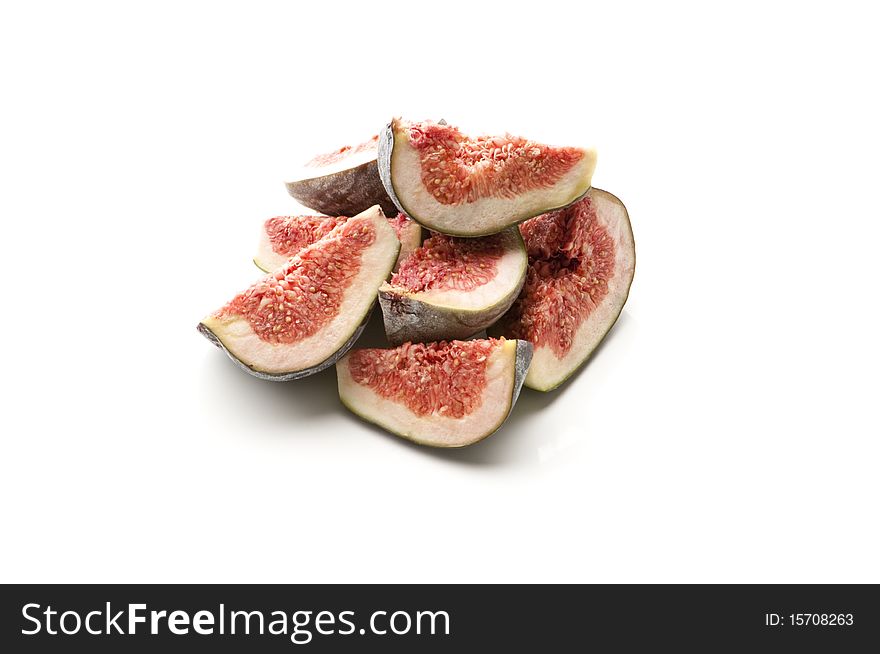 Sliced figs on a white isolated background.