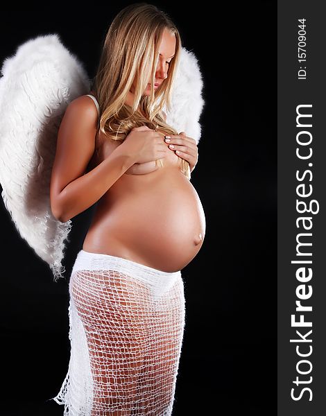 Pregnant Angel On Black Background