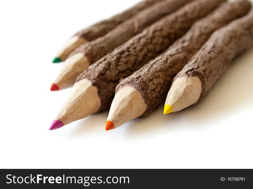 Colored pencils isolated on white background