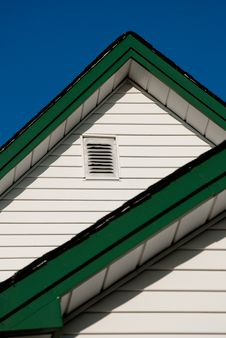 Farmhouse Roof Peak Against A Blue Sky. Royalty Free Stock Photography Farmhouse Roof Peak Against A Blue Sky. Royalty Free Stock Photography