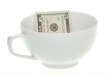 Five Dollar Bill In A White Mug Cup Stock Photography Five Dollar Bill In A White Mug Cup Stock Photography