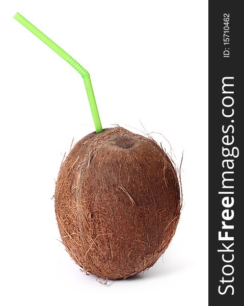 Coconut with straw isolated on white