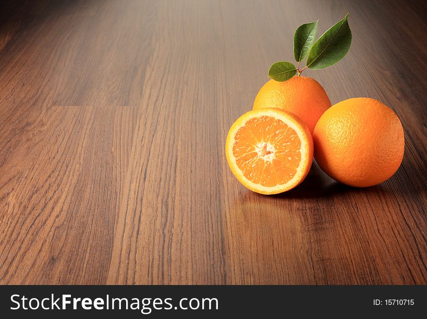 Fresh oranges on a table. Fresh oranges on a table.