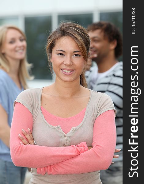 Young Woman Standing With Arms Grossed