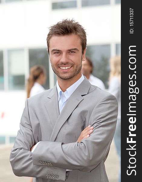 Portrait of young smiling businessman. Portrait of young smiling businessman