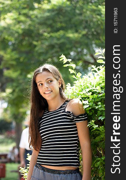 Portrait of beautiful brunette girl with long hair . Portrait of beautiful brunette girl with long hair .