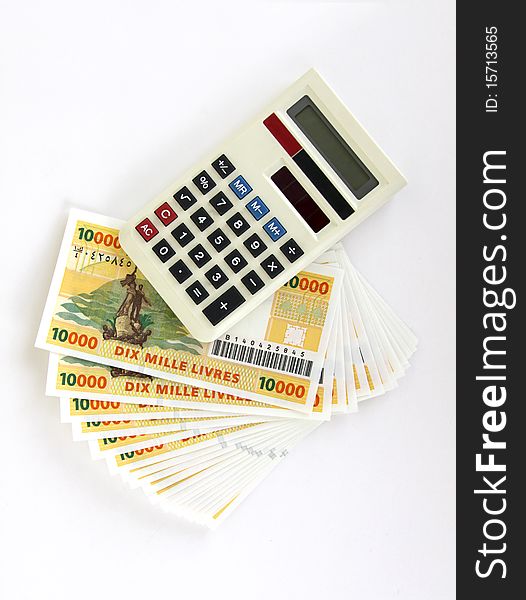 Calculator and money isolated on a white backgorund