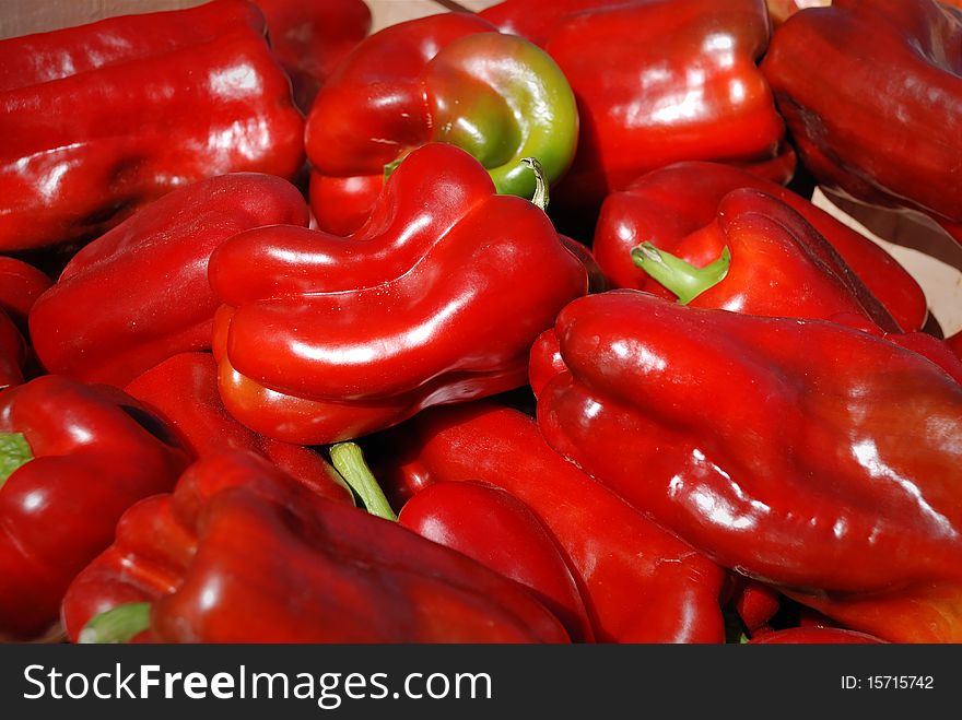 Group of colorful red peppers background
