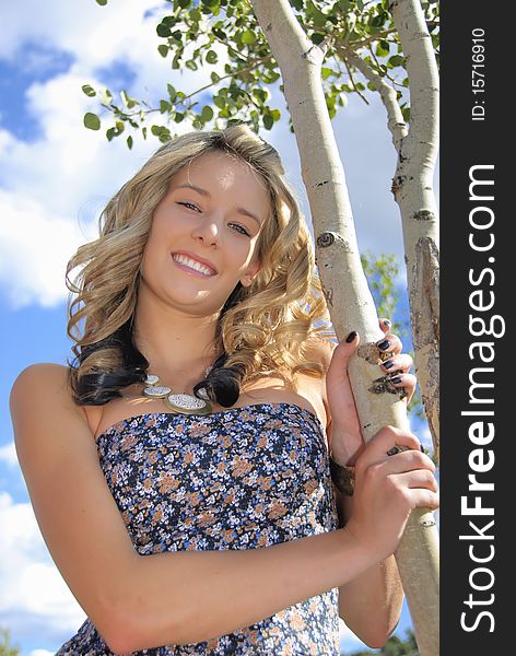 Colorado teenage girl by aspen tree. Colorado teenage girl by aspen tree.