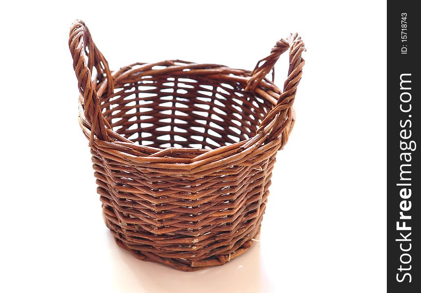 Braiding small basket on a white background