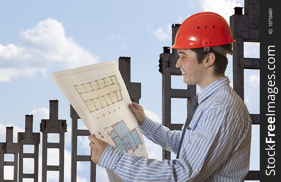 Men architect looking at a new construction plan