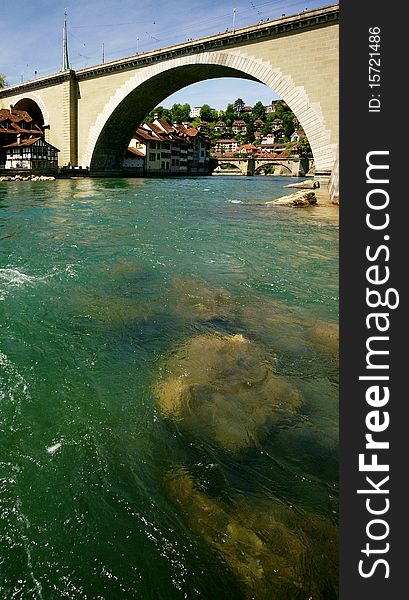 An old bridge is crossing the Aare River in Berne, Switzerland.