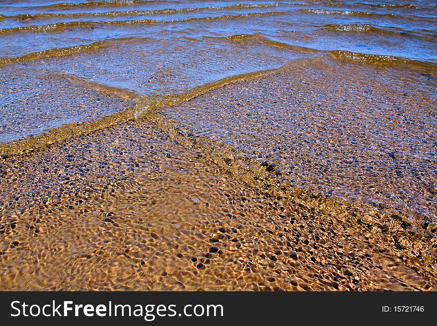 Ripples on water. Patches of light and waves. Ripples on water. Patches of light and waves.