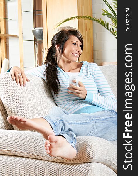 Woman Is Smiling And Relaxing