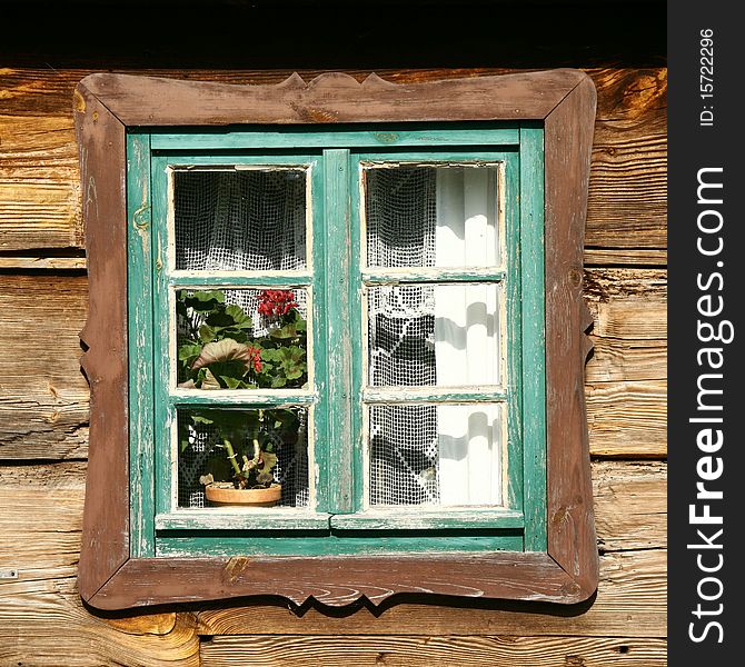 Window of an ancient wooden house, europe. Window of an ancient wooden house, europe