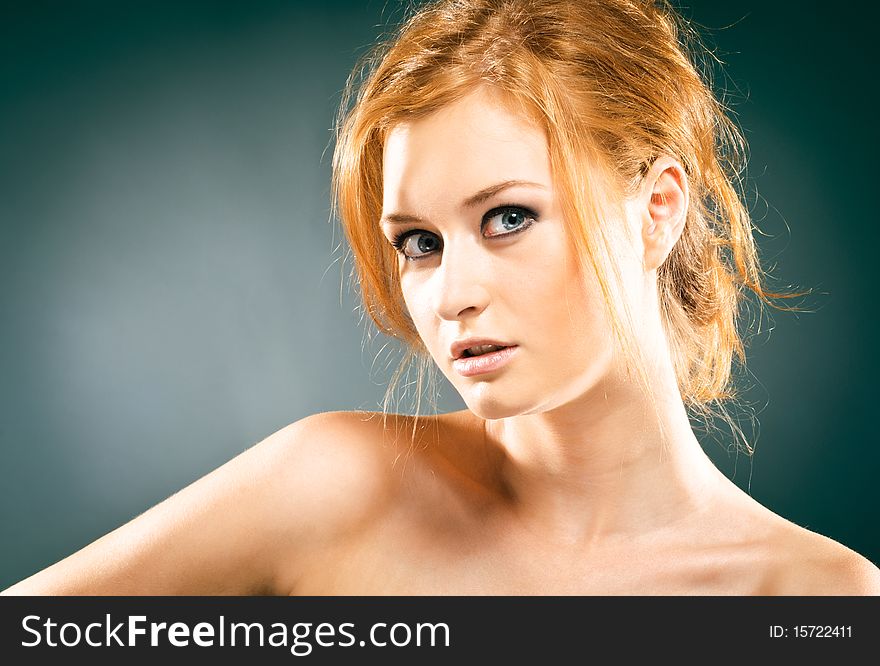 Portrait of a young red-haired woman. Portrait of a young red-haired woman