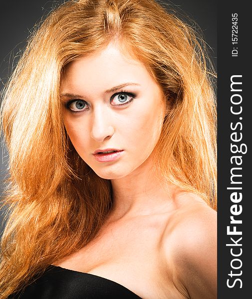 Portrait of a young red-haired woman. Portrait of a young red-haired woman