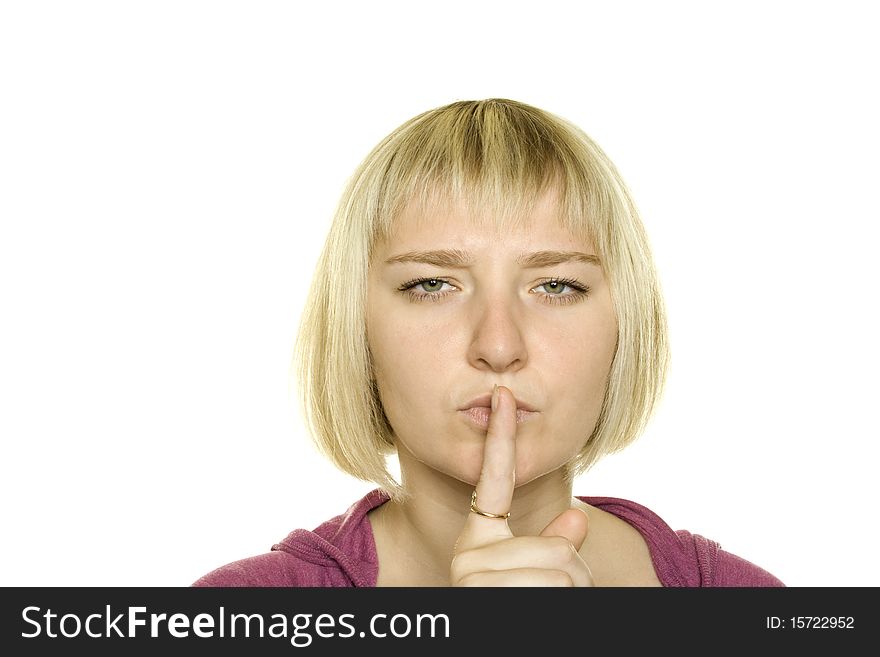 Young Woman Gesturing for Quiet or Shushing. Isolated on white background. Young Woman Gesturing for Quiet or Shushing. Isolated on white background