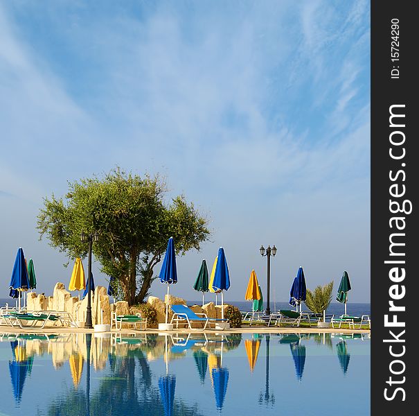 A beautiful view of a south resort as place for tourists. Image taken on a sky and water background.