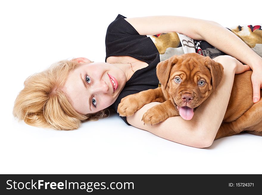 Young girl with puppy of Dogue de Bordeaux (French mastiff). Isolated on white background