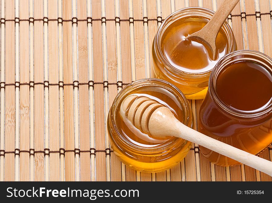 Three glass pot with honey