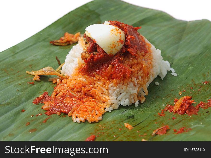 Close up of nasi lemak (Malaysia National Dish) isolated on white background.