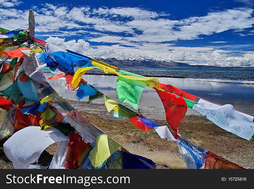 Scripture flag near the Mapam Yumco lakeÃ£â‚¬â€šThe Mapam Yumco lake is one of tibet's holy lake.It is the biggest holy lake in tibet. Scripture flag near the Mapam Yumco lakeÃ£â‚¬â€šThe Mapam Yumco lake is one of tibet's holy lake.It is the biggest holy lake in tibet.