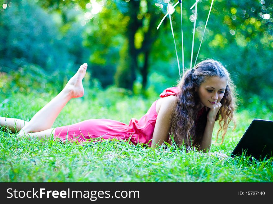 Girl in the park with notebook. Girl in the park with notebook