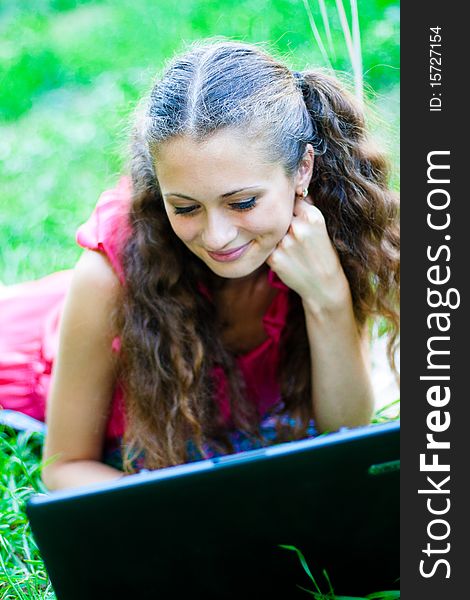 Girl in the park with notebook. Girl in the park with notebook