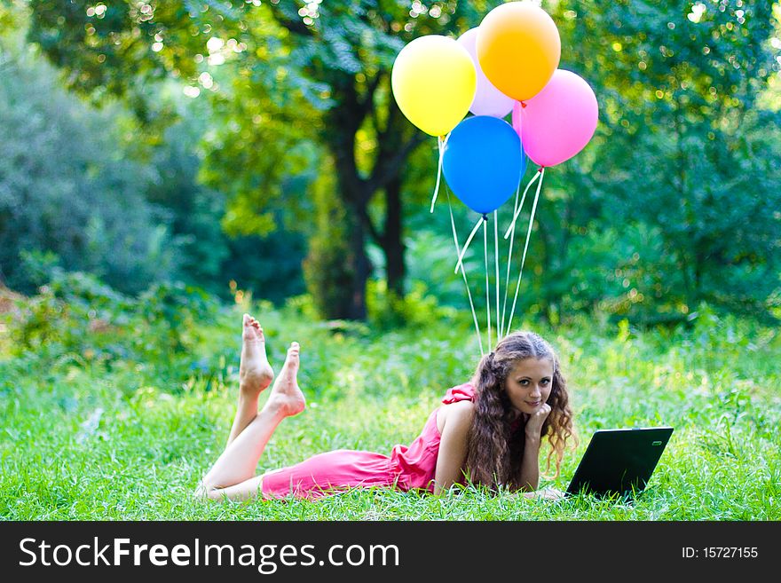 Girl in the park with notebook. Girl in the park with notebook