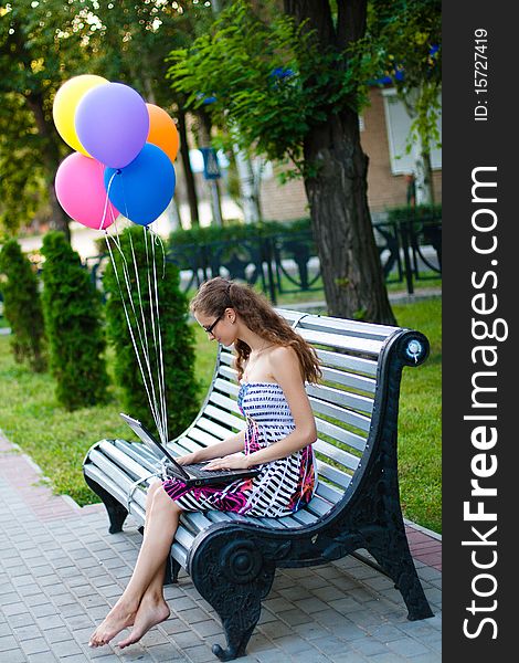 Girl in the park with notebook. Girl in the park with notebook