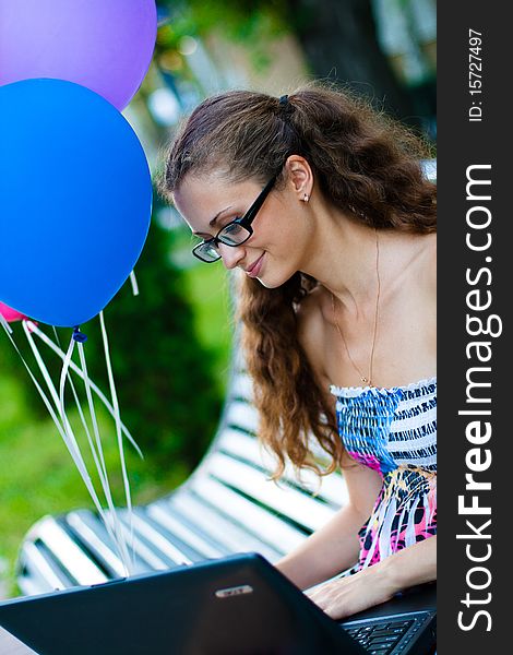 Girl in the park with notebook. Girl in the park with notebook