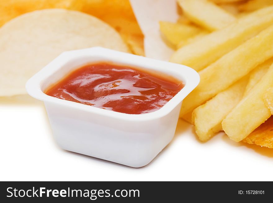 Potato chips with sauce still life