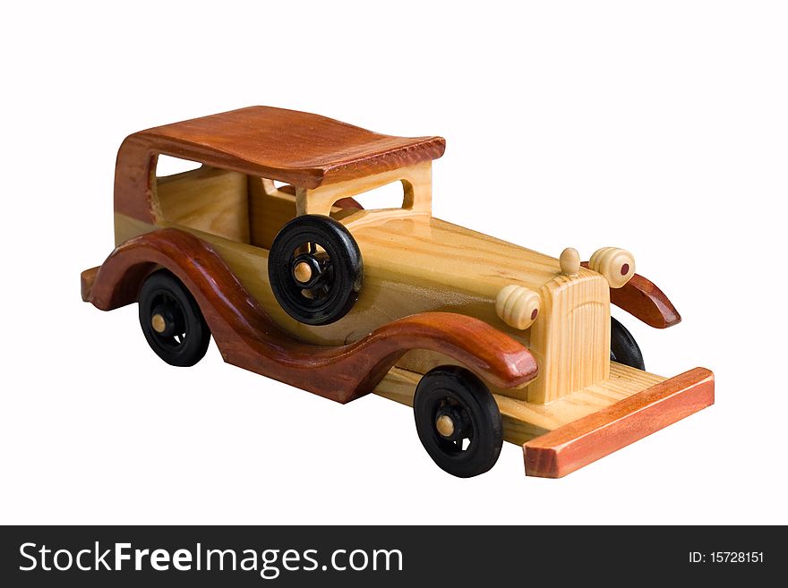 Natural wooden toy car, a white background isolated