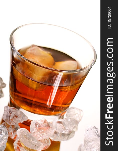 Cold whisky with ice cubes
