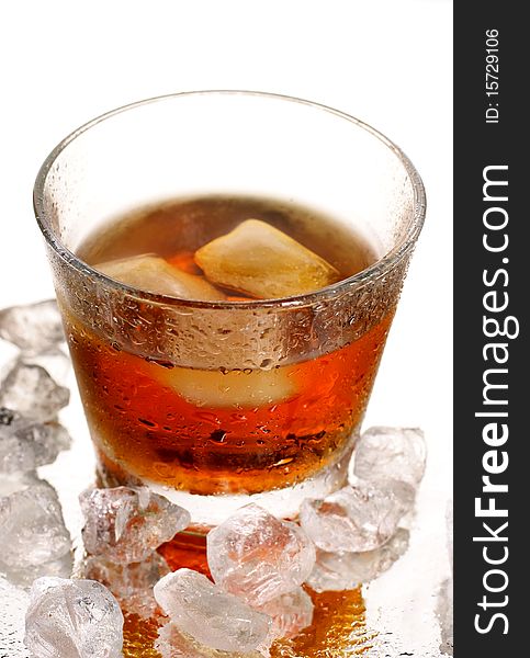 Cold whisky with ice cubes