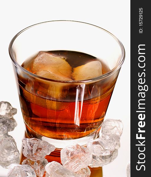 Cold whisky with ice cubes