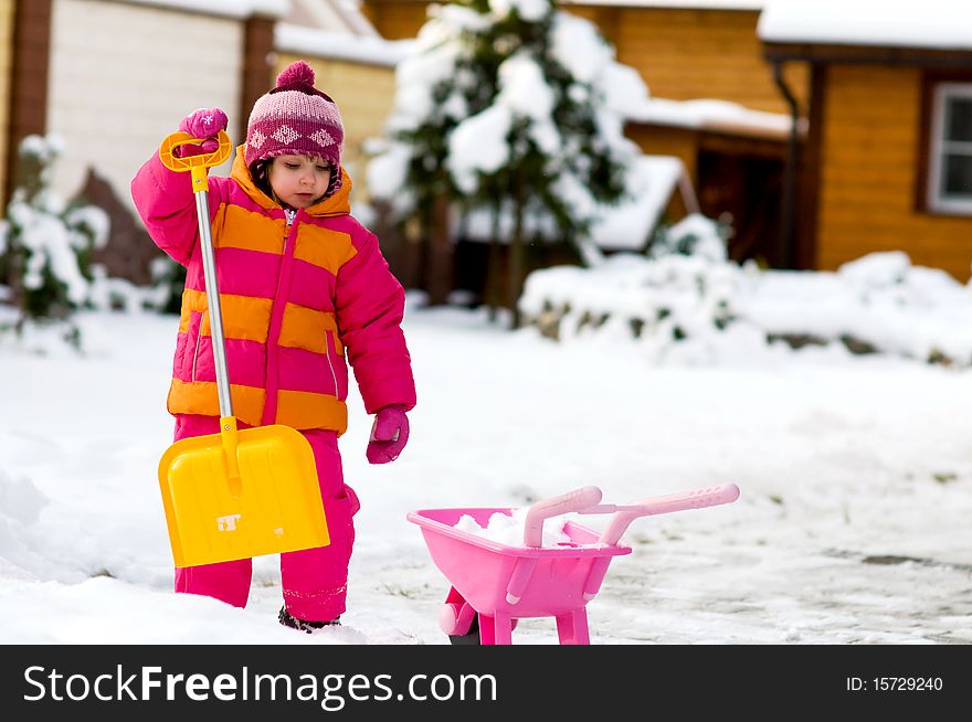 Nice Little Girl Playing With Snow