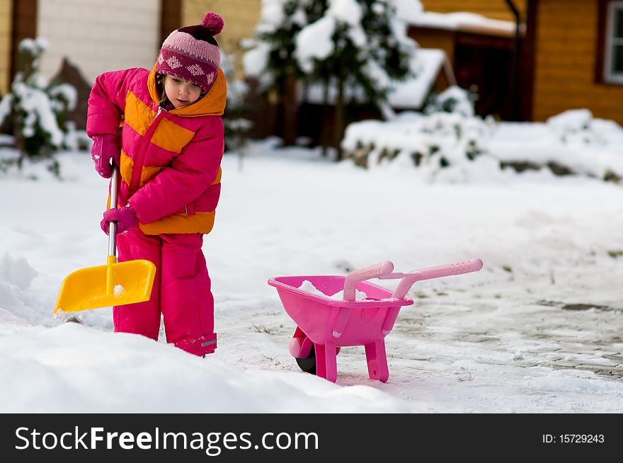 Nice Little Girl Playing With Snow