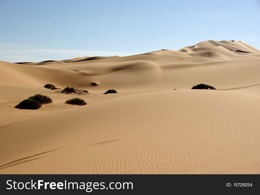 Sand dunes in the desert of Libya, in Africa. Sand dunes in the desert of Libya, in Africa