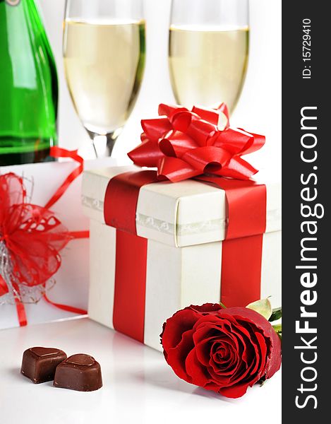 Beautiful red rose, champagne and chocolate close up. Beautiful red rose, champagne and chocolate close up