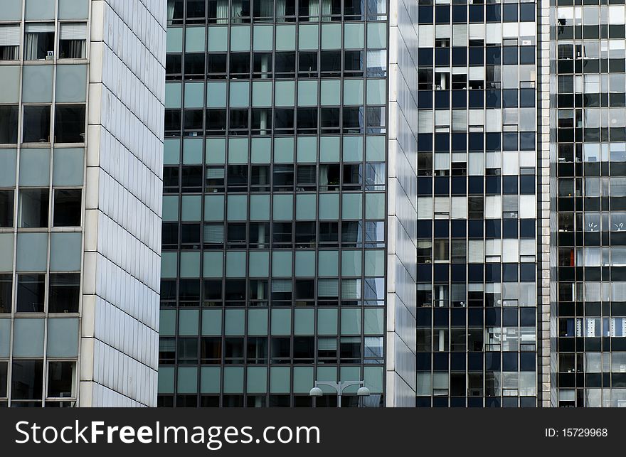 Windows of several office buildings in a row