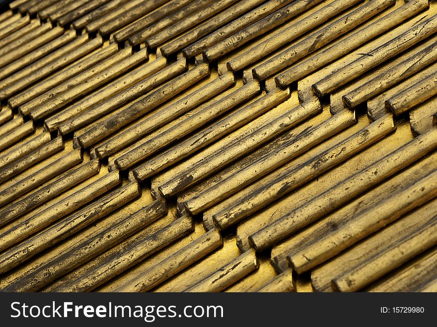 Detail of roofing tiles painted gold. Detail of roofing tiles painted gold