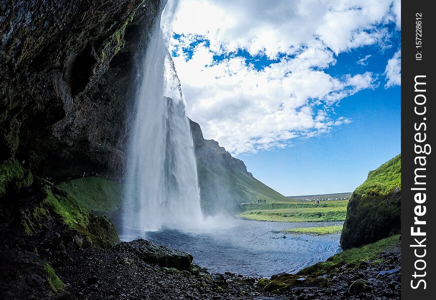 View of Seljalandsfoss Waterfall, tourist most popular natural attraction in South Iceland. Summer season. View of Seljalandsfoss Waterfall, tourist most popular natural attraction in South Iceland. Summer season