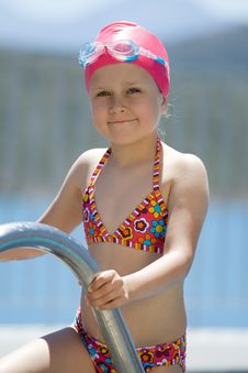 Little Child In Bathing Cap, Glasses On Pool Stair Stock Photos