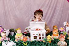 Baby Girl And Doll House Royalty Free Stock Photography Baby Girl And Doll House Royalty Free Stock Photography