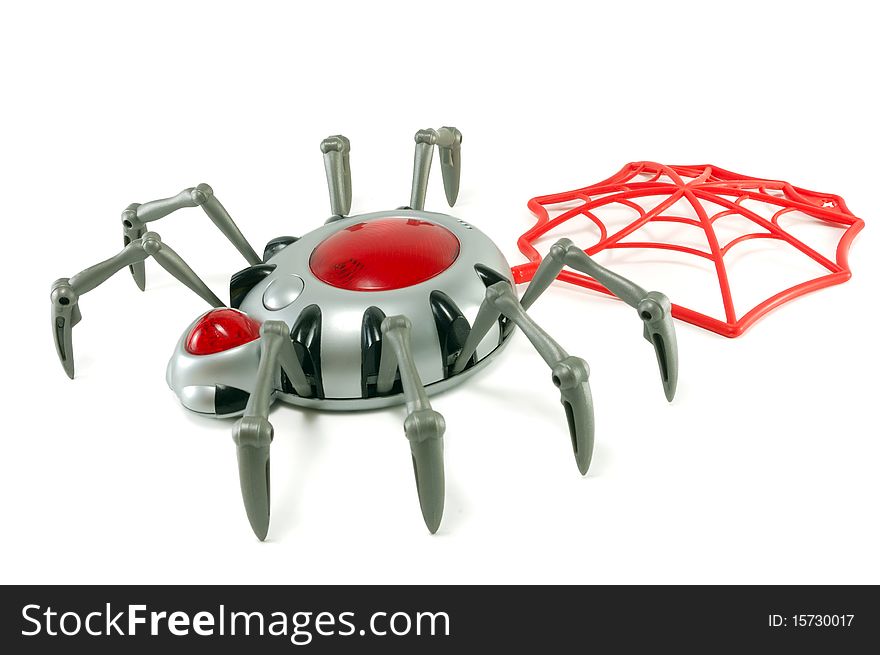 Toy a spider with a web are isolated on a white background